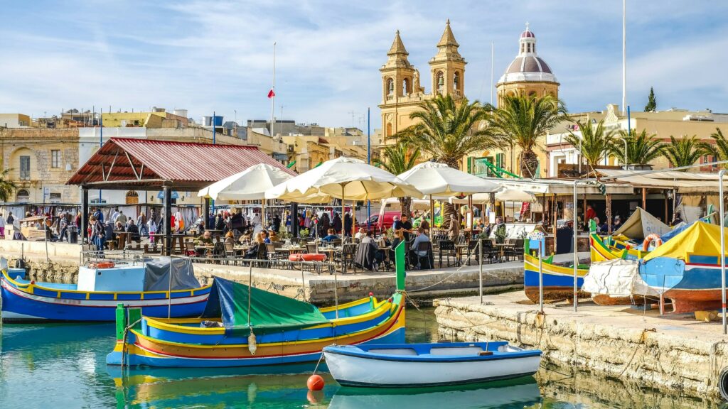 Voyage à Malte au port Luzzu Marsaxlokk Tyché Company